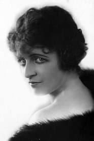 Olive Tell as Mrs. Carlton