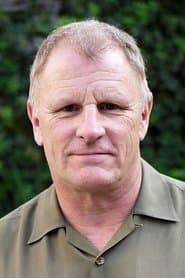 Gordon Clapp as Tom Garrett