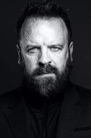 Simon Phillips as Charles