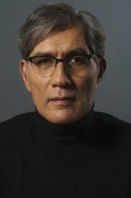 Denzil Smith as Commissioner