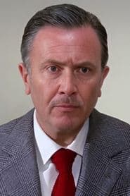 Tom Felleghy as Newspaper Editor-in-Chief