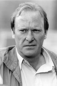 Dennis Waterman as Simon Carlson
