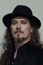 Tuomas Holopainen as Tom Whitman (age 47)