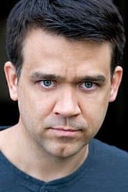 William Meredith as Reverend Jim Jones