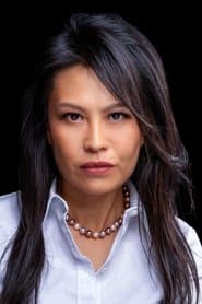 Lydia Look as Ms. Okata