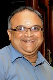 Mohan Raman as Chitra's father-in-law