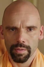 Zachary Coffin as Stanislav the Cop