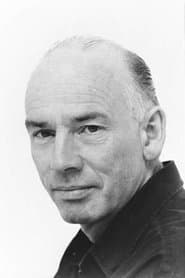 John Kavanagh as Father Carlin