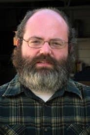 John Karyus as Man in Car