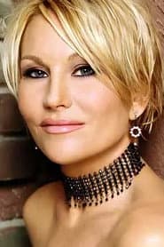 Schae Harrison as Mrs. Carlisle