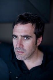 Zohar Shtrauss as Aaron Fleischman