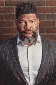 Mars Crain as Strong Man / Milos