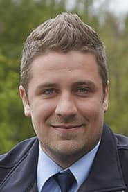 Michal Holán as Adámek