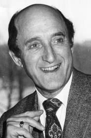 Ron Moody as Dr. Henry Gropinger ( Kissinger )