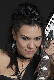 Jen Majura as Self - Rhythm Guitar / Theremin / Backing Vocals
