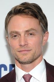 Wilson Bethel as Travis