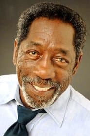 Grover Coulson as Man in Wheelchair