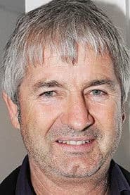 John Jarratt as Mick Taylor