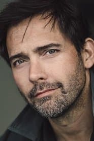 Andrew Bowen as Scott Cowley