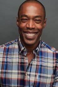 Michael McElroy as Tom Collins