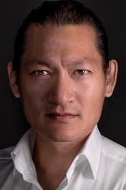 Thomas Chaanhing as Huang