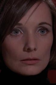 Jane Hallaren as Janet