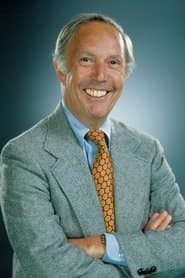 Mason Adams as Deputy Director Brown