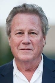 John Heard as Charlie Bloom