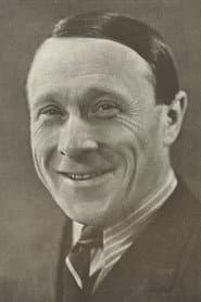 Hans W. Petersen as Grocer