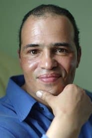 Symon Basterfield as Self (archive footage)