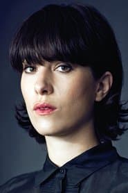 Andrea García-Huidobro as Julia (sister)