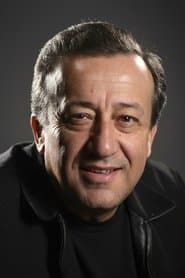 Ulvi Uraz as the Antique Dealer