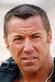 Mike Mitchell as John 'Mad Dog' McKellen