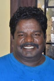 Crane Manohar as Tea Stall Owner