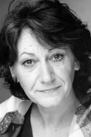 Colette Maire as La concierge de Macha