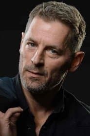 Mikael Birkkjær as Carsten