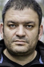 Shmulik Cohen as Shlomi's Father