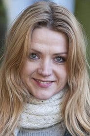 Malin Morgan as Train passenger