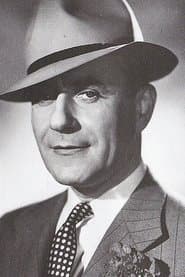 Jean-Max as Councilor Smolen