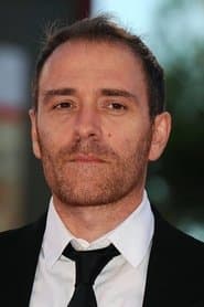 Valerio Mastandrea as Enrico Giusti