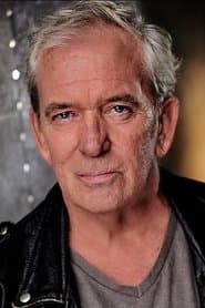 James Martin Kelly as Officer Benton