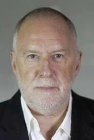 Christian Benedetti as Etienne Robert, publisher