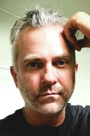 Joshua Weigel as Pastor Mark